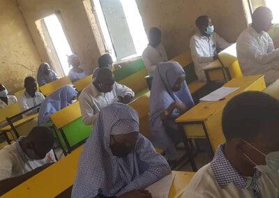 Class in Nigeria with students wearing masks