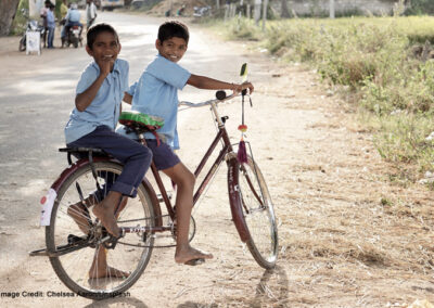 School boys on a bike in Hampi, India.