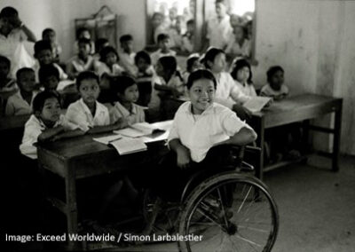 classroom scene with child in wheelchair