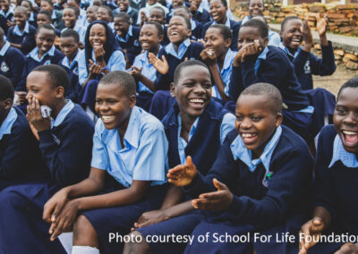 Group of smiling Ugandan school children