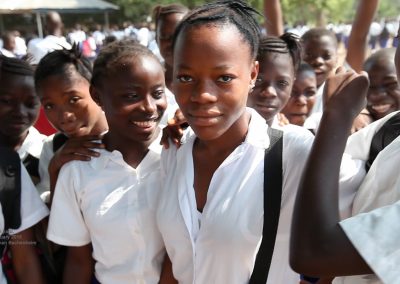 A group of teenage African school children in school uniform