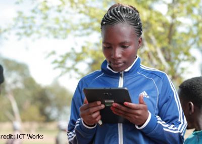 Student holding a mobile device