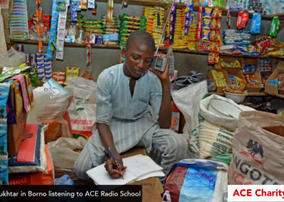 Boy doing school work listening to the radio