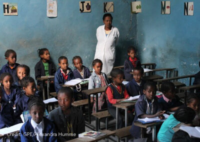 Primary school teacher in her class