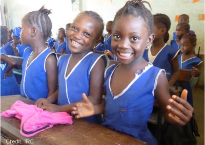 smiling girls in a classroom in Sierra Leone