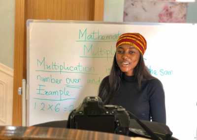 Teach For Nigeria teacher Precious Adegunle recording a math lesson at home for her students