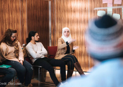 Higher education students in a seminar