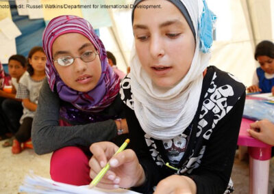 Alia and Basma, both aged 12, tackle a maths question at a temporary school in northern Lebanon.