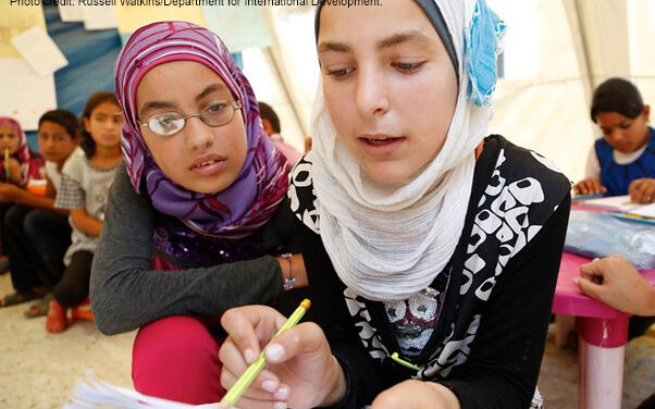 Alia and Basma, both aged 12, tackle a maths question at a temporary school in northern Lebanon.