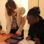 Training enumerators to use electronic tests on the Kindle, Nairobi, Kenya.