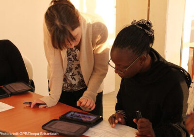 Training enumerators to use electronic tests on the Kindle, Nairobi, Kenya.