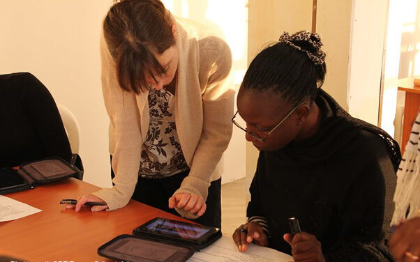 Training enumerators to use electronic tests on the Kindle, Nairobi, Kenya.