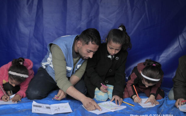 UNRWA staff provides psychosocial support to displaced girls through recreational activities in Al Mawasi area, west of Khan Younis, Middle Areas, Gaza.