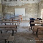 Classroom, Kissan Inter College, Mathura (Uttar Pradesh), India, December 2024Empty desks and chairs in a class, with a a few school bags on chairs